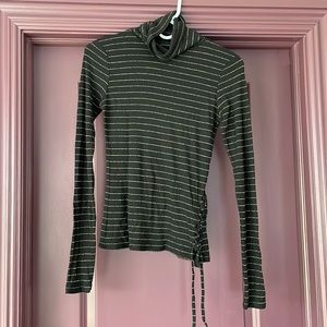 Generation Love black turtle neck with gold detail